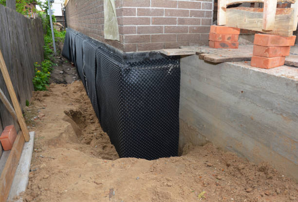 Happy homeowners after waterproofing job in Cross Plains